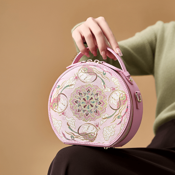 2_Song_Brocade_Pink_Retro_Round_Bag_Lotus_Lucky_Rabbit_Pattern_-_SinoCultural 2_Song_Brocade_Pink_Retro_Round_Bag_Lotus_Lucky_Rabbit_Pattern_-_SinoCultural