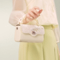 model-arm-carry-orchid-butterfly-bag