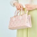 song-brocade-leather-handbag-pink-gold-dingsheng-motif-model-crossbody